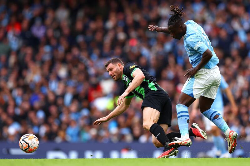 James Milner of Brighton & Hove Albion is challenged by Jeremy Doku of Manchester City. Photograph: Naomi Baker/Getty