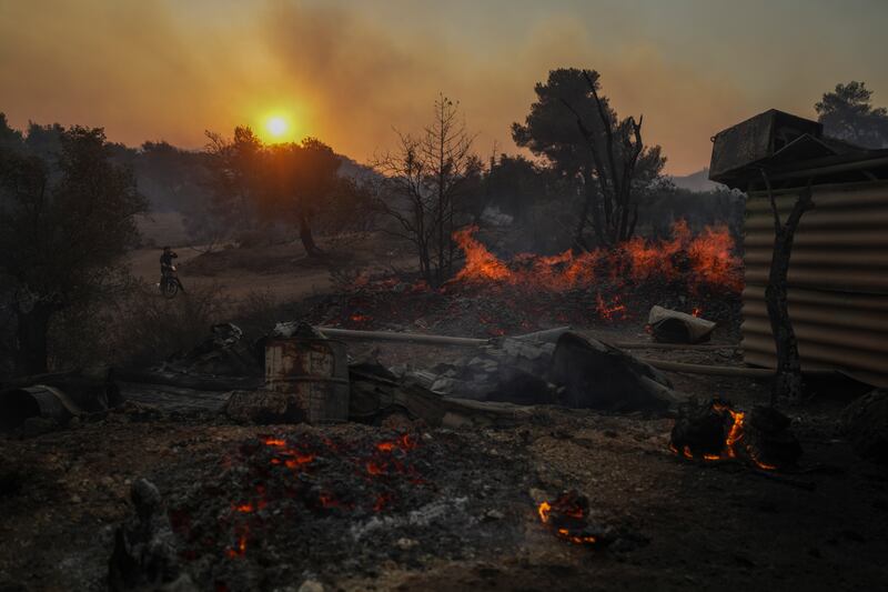 A shipyard on fire in Mandra, west of Athens. Photograph: Petros Giannakouris/AP/PA