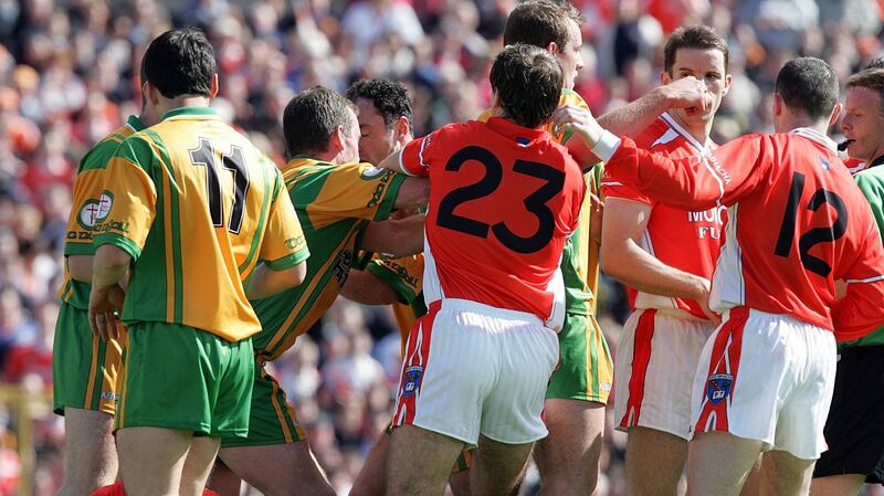 Armagh’s Patrick McKeever and Donegal’s Barry Monaghan tangle  during  the combustible Ulster championship quarter-final replay between Armagh and Donegal in 2005. Four players were sent off as Donegal finished the game with 12 men. Armagh won 3-11 to 1-10. Photograph: Andrew Paton/Inpho