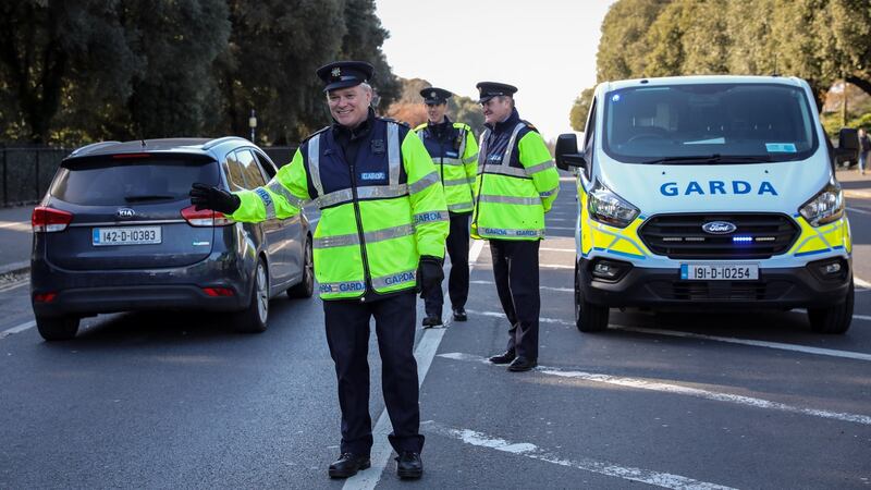 Gardaí in the Phoenix Park: they must be seen to enforce the movement-restriction rules evenly but with discretion. Photograph: Crispin Rodwell