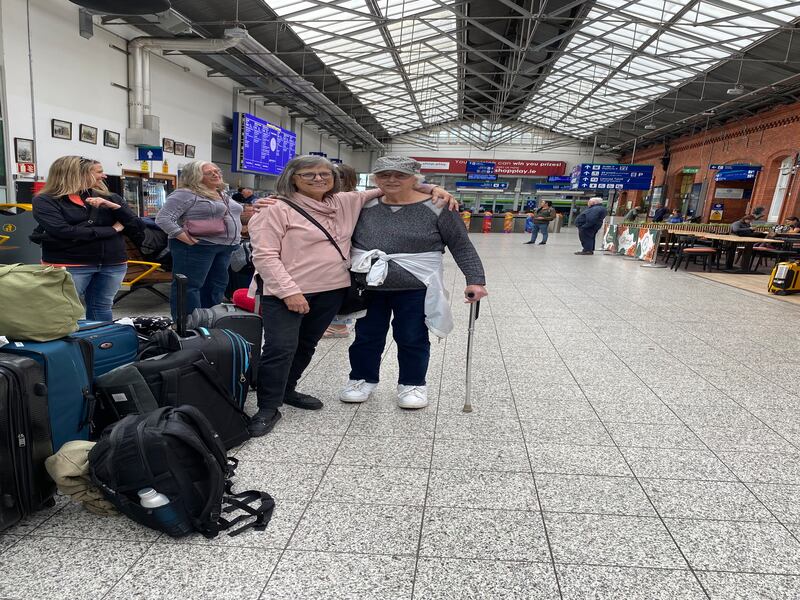 Standing on the concourse of Cork Kent train station, (l-r) sisters Marie Des Marais and Nancy Lietz, from Wisconsin, wait with family members for the train to Dublin.  Train Travel Feature, Irish Rail statement and pics via Aine Ryan. June 2024