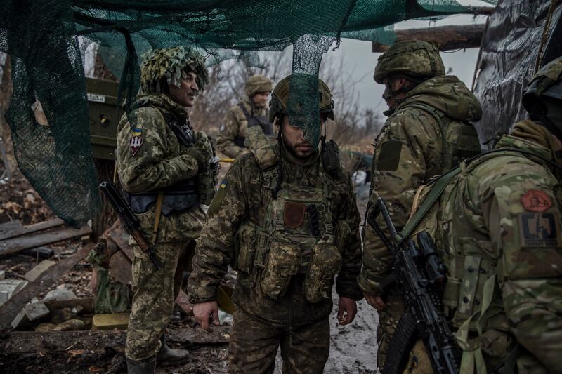 Members of the 79th Air Assault Brigade in a trench in an area of Marinka, in eastern Ukraine. Photograph: Tyler Hicks/New York Times