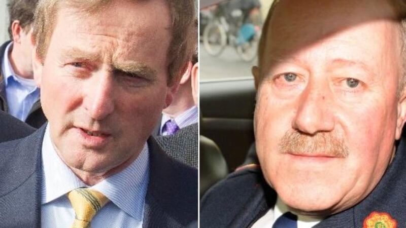 Taoiseach Enda Kenny (left) said it is now a matter for Mr Justice Nial Fennelly when the draft report into the resignation of the former Garda commissioner Martin Callinan is published.