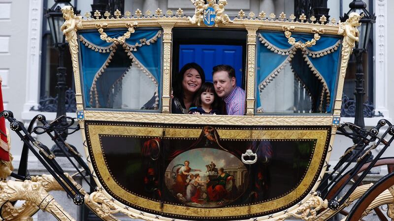 Hazel Chu and partner Patrick Costello and their daughter, Alex, in the Lord Mayor’s carriage. ‘Whether [Alex] grows up being trolled or not, or abused racially or not, she still has to have tough skin,’ Chu says