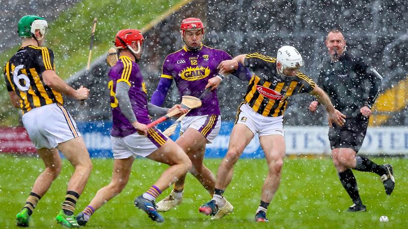 Lee Chin and Conor Fogarty in action at Wexford Park. Photograph: Tommy Dickson/Inpho