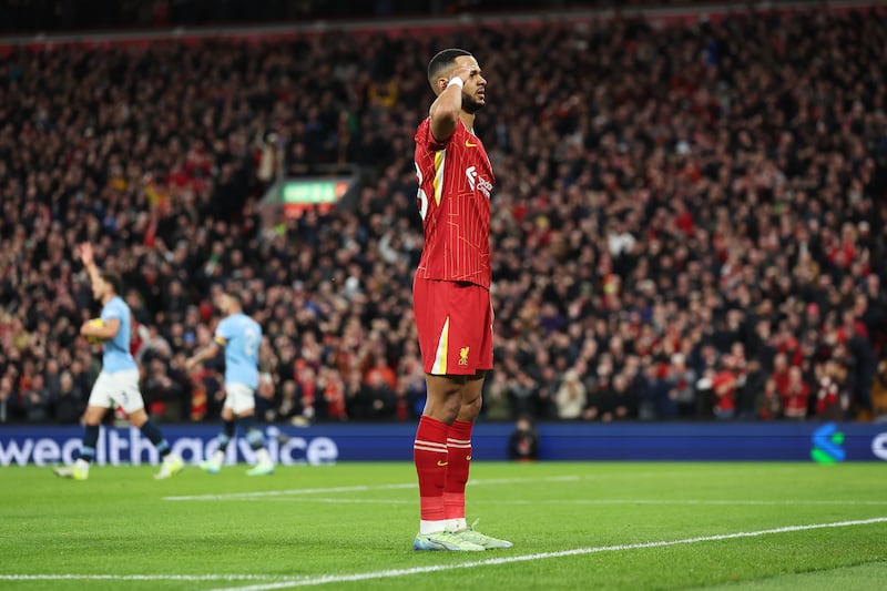 Cody Gakpo of Liverpool celebrates scoring his team's first goal against Manchester City. Photograph: Carl Recine/Getty