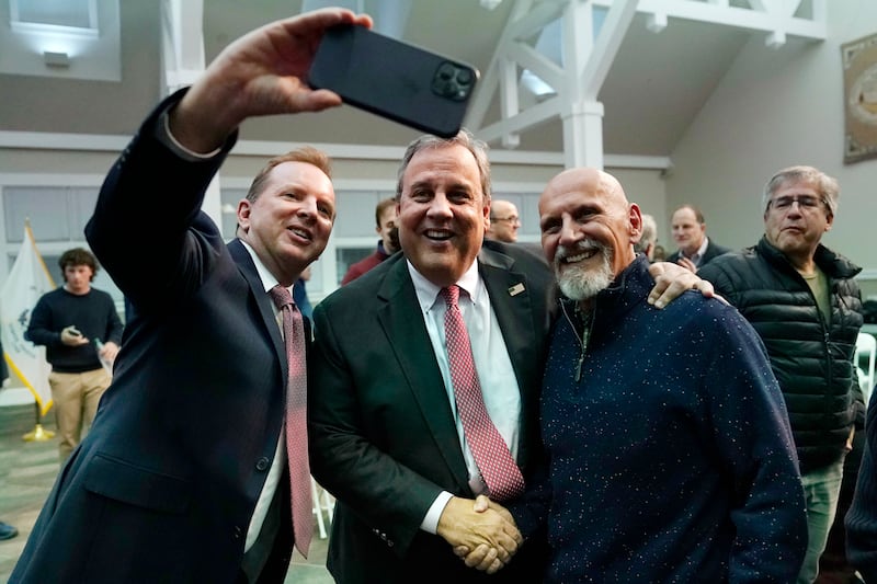 Chris Christie (centre) poses for a selfie after a town hall-style meeting at New England College in April in Henniker, New Hampshire, US. Photograph: Charles Krupa/AP