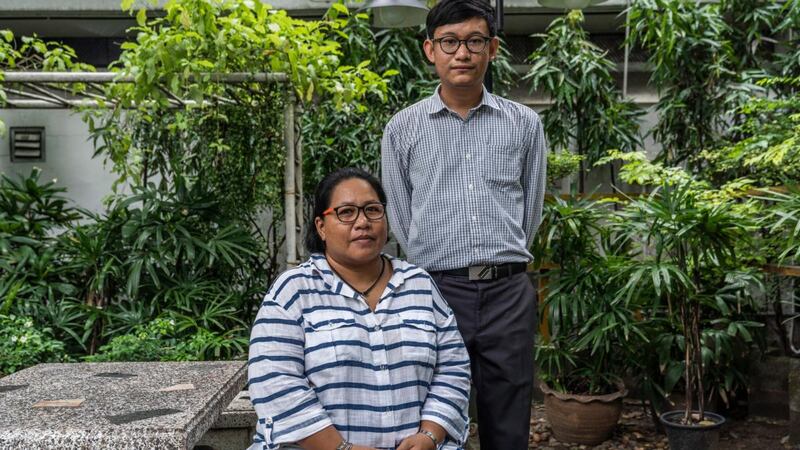 Patnaree Chankij, mother of attacked activist Sirawith Seritiwat, with Weerachai Fendi, a friend of Seritiwat. Photograph:  Adam Dean/New York Times