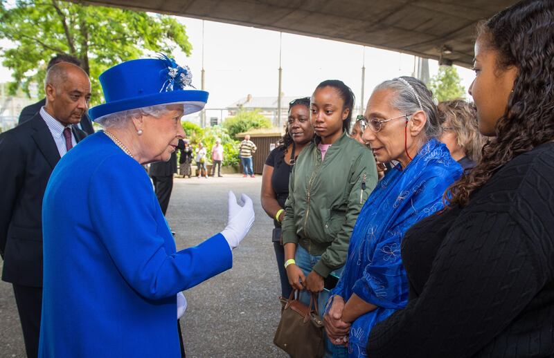 The queen meets members of the community affected by the fire at Grenfell Tower in west London on Friday. Photograph: PA