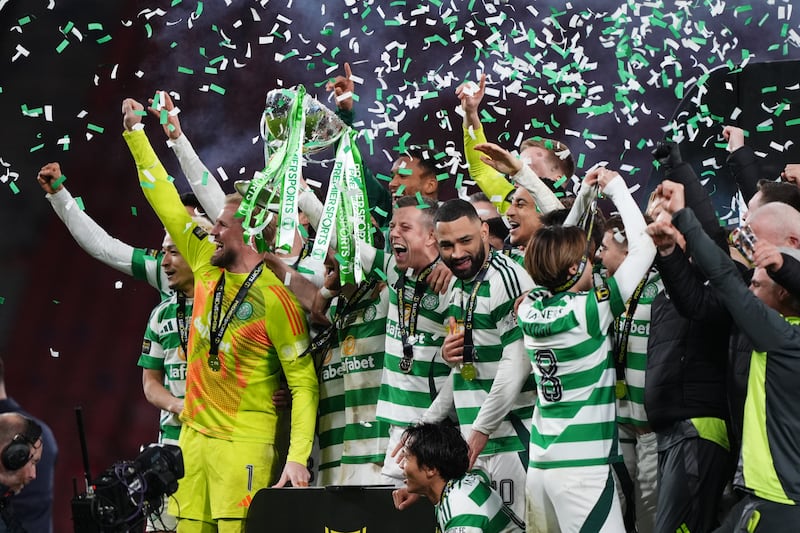 Celtic players celebrate winning the Premier Sports Cup Final at Hampden Park. Photograph: Andrew Milligan/PA Wire