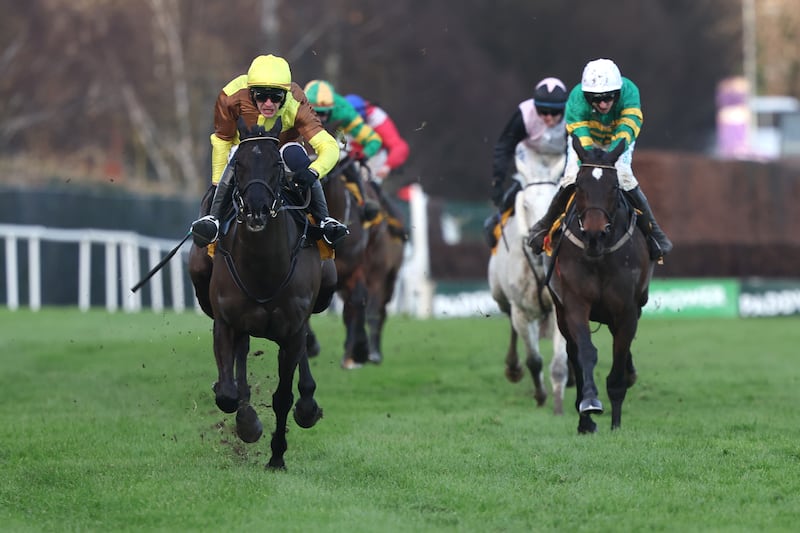 Galopin Des Champs (left) on the way to winning the Savills Steeplechase ahead of Fact to File (right). Photograph: Damien Eagers/PA