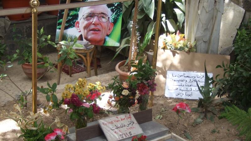 The grave of 75-year-old Dutch Jesuit priest Frans van der Lugt in the garden of the monastery where he lived and suffered starvation with the inhabitants of the Old City, refusing to leave after insurgents seized control and the government mounted a siege and blockade. Photograph: Karin Leukefeld