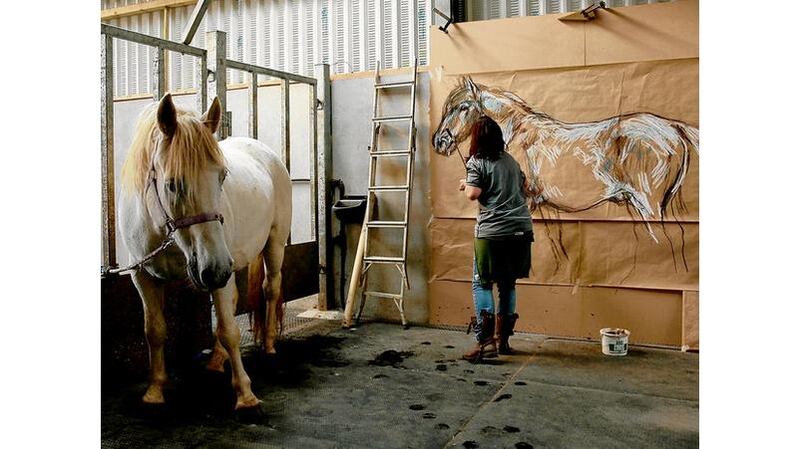 Nicola Hicks making charcoal drawings of the island ponies