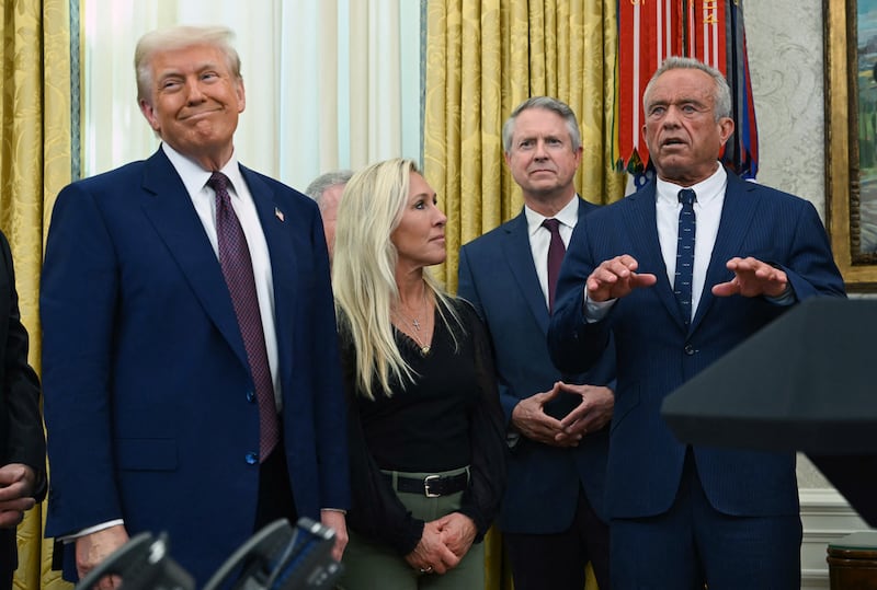 Vaccine critic Robert F Kennedy jnr, right, speaks after being sworn in as US Secretary of Health and Human Services. Photograph: Andrew Caballero-Reynolds/Getty