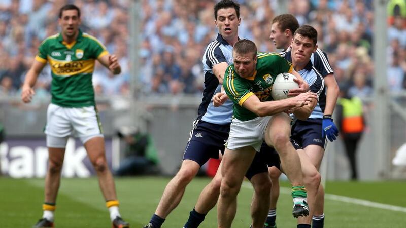 Dublin’s Michael Darragh Macauley and Diarmuid Connolly try to halt Tomás Ó Sé making one of his trademark surges upfield from wing back. The great Kerry defender has announced his retirement from inter-county football. Photograph: Ryan Byrne/Inpho