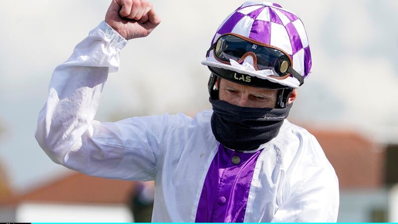 Kevin Manning celebrates his 2000 Guineas win on Poetic Flare. Photograph:   Alan Crowhurst/Getty