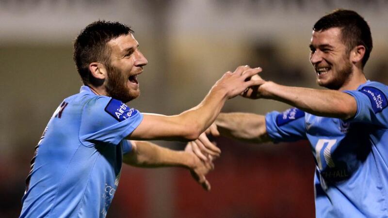 Drogheda’s Gavin Brennan celebrates with his brother Ryan Brennan aftre scoring against Shelbourne at Tolka Park. Photograph:  James Crombie/Inpho