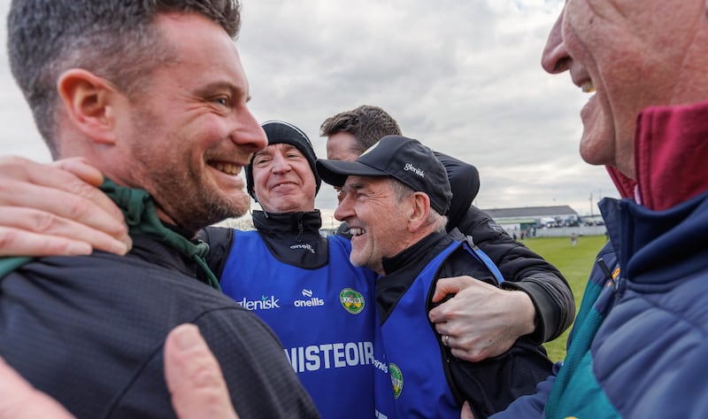 Offaly’s joint managers Mickey Harte and Declan Kelly celebrate with coach Luke Bree after beating Kildare. Photograph: James Crombie/Inpho