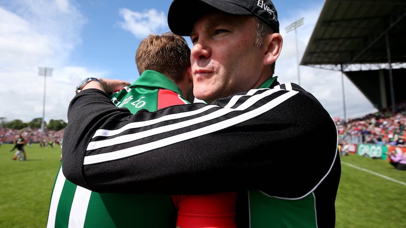 Mayo manager James Horan with Aidan O’Shea at the end of 2014 Connacht final. Photograph: Donall Farmer/Inpho