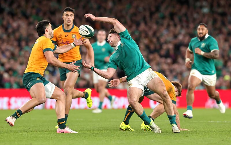 Keenan loses the ball after being challenged by Andrew Kellaway of Australia during their Autumn Nations Series match. Photograph: David Rogers/Getty Images