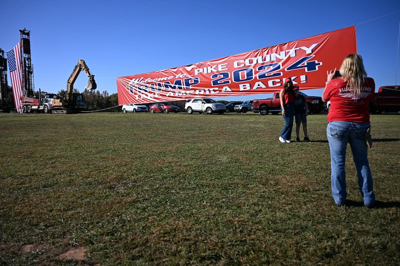 People arrive to see Republican presidential candidate Donald Trump speak in Zebulon, Georgia. Photograph: Jim Watson/AFP via Getty Images