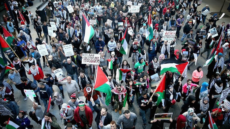 Demonstrators march in the Loop in Chicago protest over what they perceive as Israeli aggression in the occupied West Bank and Gaza. Photograph: Getty