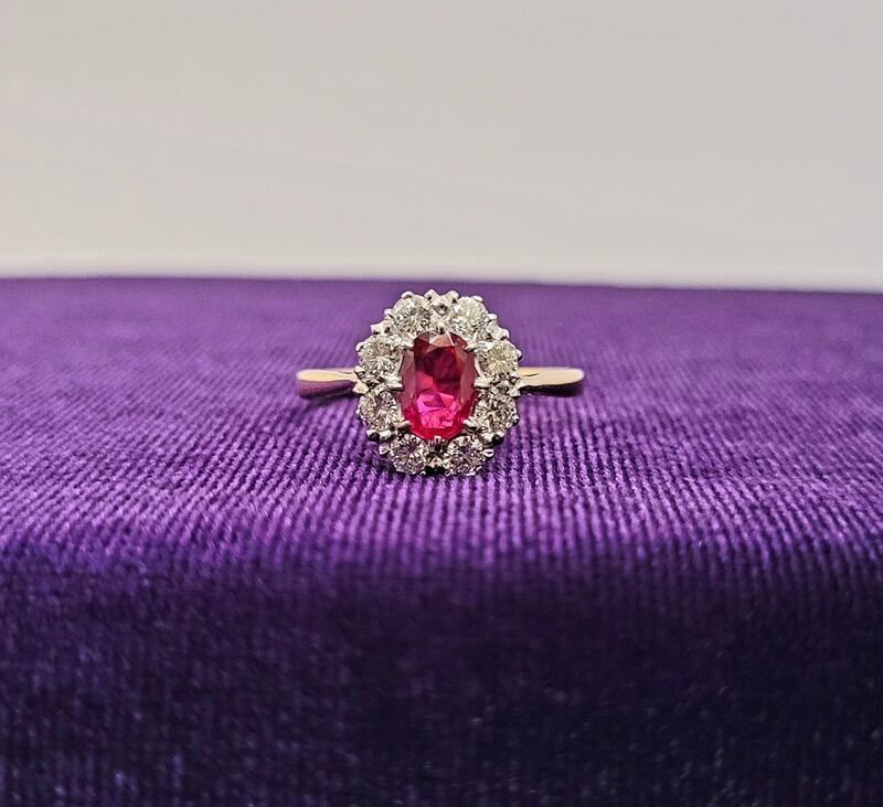 An 18ct yellow gold and platinum diamond and ruby cluster ring (€1,500-€2,000), Hegarty's auction