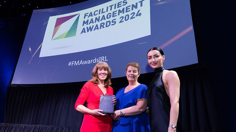 Deirdre Saunders, divisional director of Sodexo, presents the excellence in health & safety award to Niamh O'Sullivan and Katie Smith, Danone Nutricia