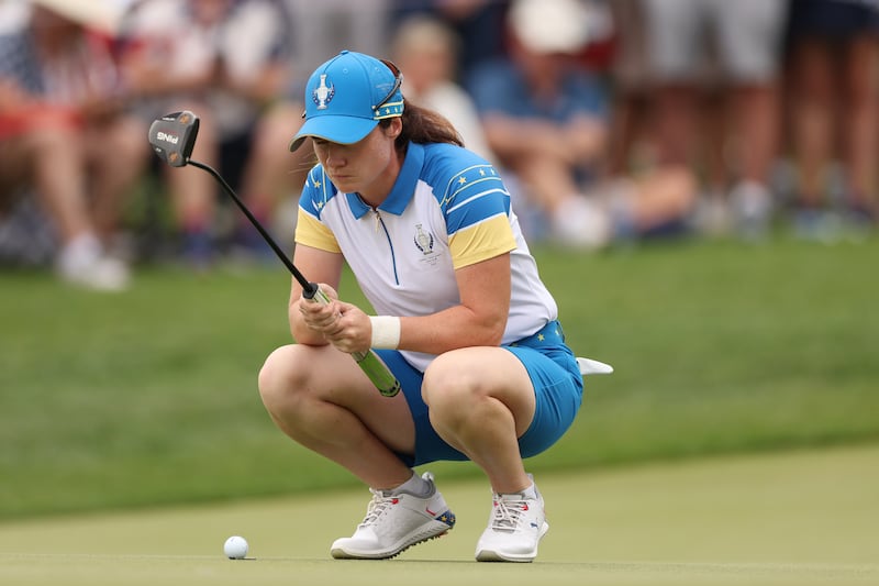 Leona Maguire lines up her putt at the Solheim Cup. Photograph: Gregory Shamus/Getty