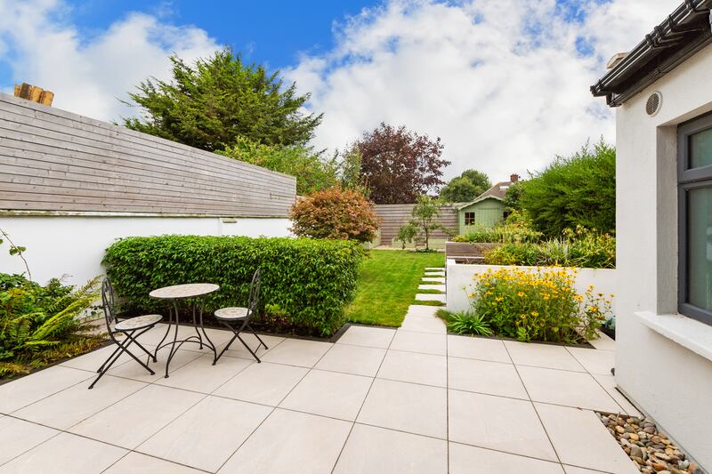 A large porcelain-tiled patio lies off the kitchen 