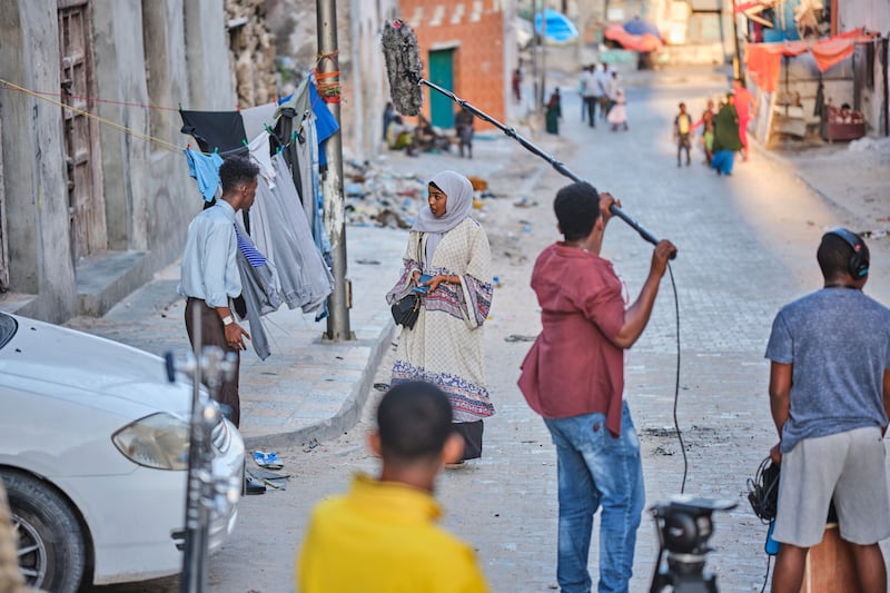 Actors during a shoot of Arday in the streets of Modagishu, the capital of Somalia. Photograph: Abdishukri Haybe