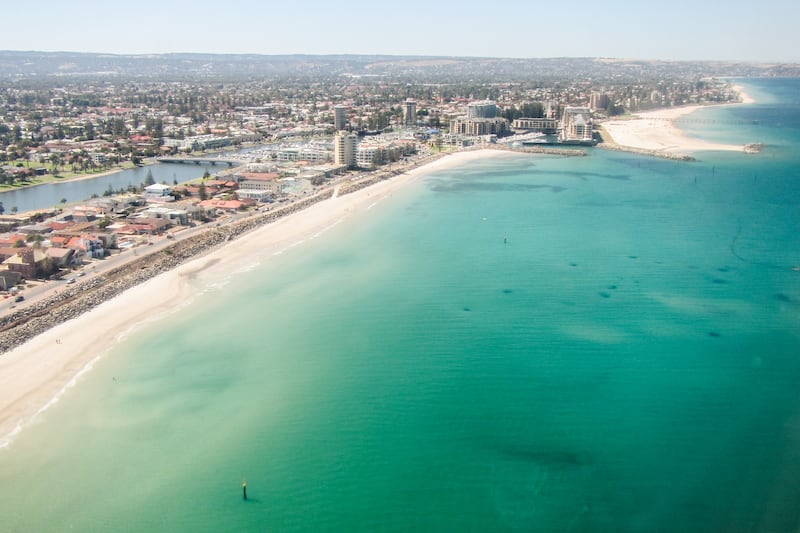 The seafront and beach at Glenelg in Adelaide. Photograph: Getty