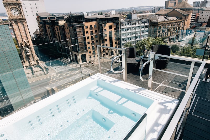 A rooftop hot tub at the Merchant Hotel. Courtesy of Studio Kin Merchant Hotel