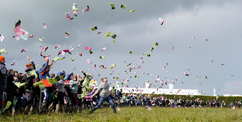 Some 955 people took part in a Guinness World Record attempt at the most people throwing wellies, organized by Youth farming group Macra,  on day two. Photograph: Niall Carson/PA Wire 