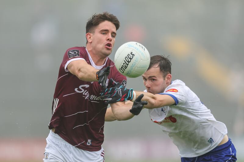 Sean Kelly of Galway in action against Monaghan's Jason Irwin. Photograph: Natasha Barton/Inpho 