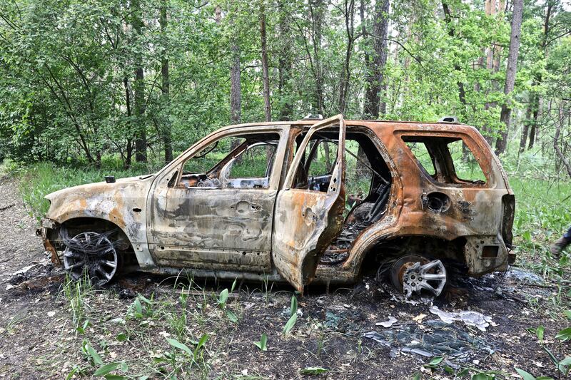 The burnt-out vehicle of Maks Levin, a Ukrainian journalist who was killed in March in a forest north of Kyiv, Ukraine. Photograph: Patrick Chauvel/Reporters Without Borders via the New York Times