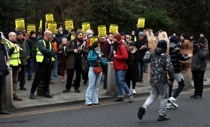 Pro-refugee protesters stood on the opposite side of the road outside the Shelbourne Dublin on Saturday. Photograph: Sam Boal/RollingNews.ie