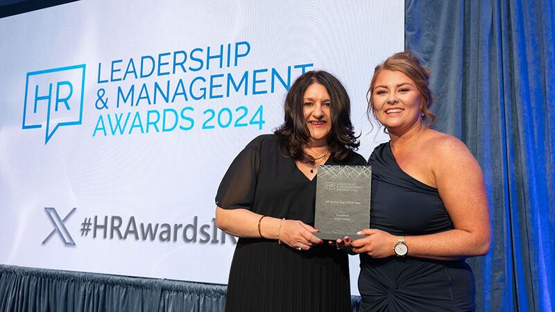 Edel Conway, awards judging coordinator, presents the HR rising star of the year award to Kaylyn Burke, CluneTech