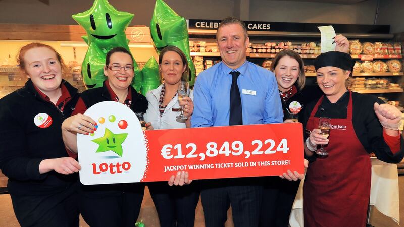 Ken O’Toole, store manager with SuperValu, Knocklyon, Dublin which sold the winning Lotto jackpot winning ticket celebrates with staff from the shop, from left, Grainne Flanagan, Nicola Bradley King, Valerie Mooney, Louise Dunne and Samantha O’Toole. Photograph: Colin Keegan/ Collins Dublin.