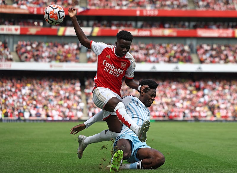 Saka is excited about playing in the Champions League this season. Photograph: Henry Nicholls/AFP via Getty