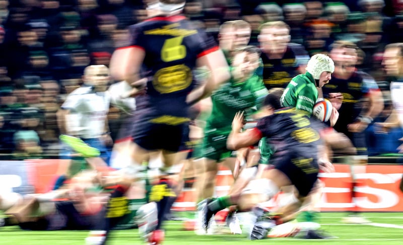 Connacht’s Mack Hansen is tackled by Ulster's Cormac Izuchukwu. Photograph: Dan Sheridan/Inpho