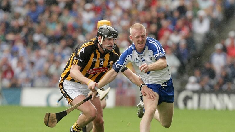 Jackie Tyrrell gets to grips with John Mullane during the 2009 All-Ireland semi-finals.  Photograph: Morgan Treacy/Inpho