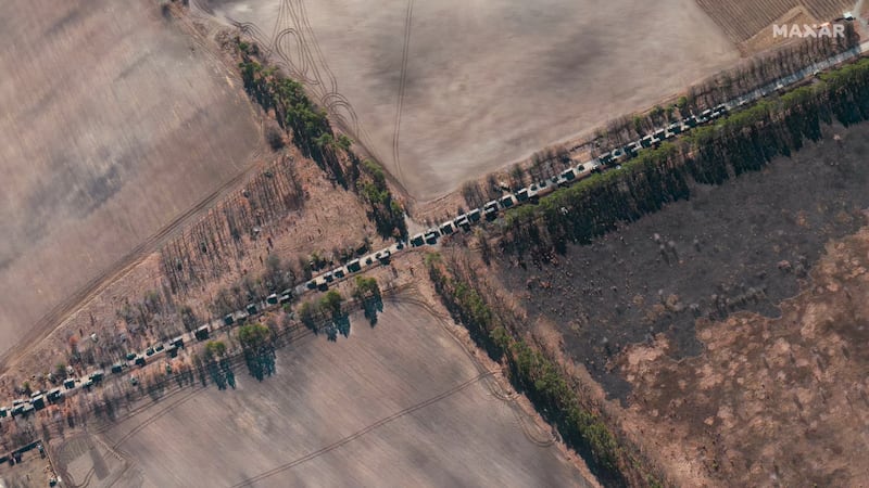 Satellite imagery of a convoy of Russian troops in southern Invankiv, Ukraine, headed towards Kyiv shortly after Russia's full-scale invasion in February, 2022.  Photograph: Satellite image (c) 2022 Maxar Technologies via Getty Images