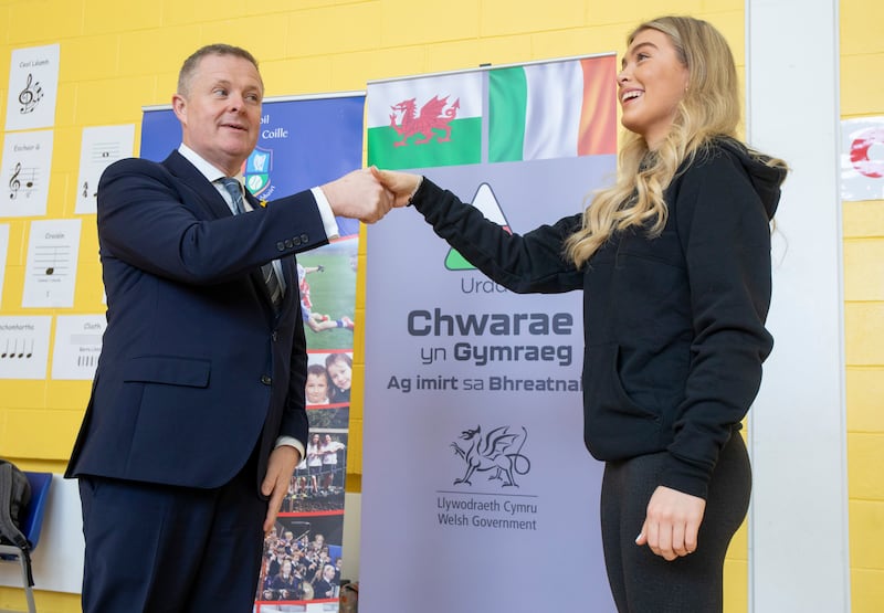 Welsh Minister for Education and Welsh Language  Jeremy Miles and Urdd Youth Ambassador Elen Morlais Williams at Gaelscoil Thaobh na Coille. Photograph: Peter Houlihan/Coalesce
