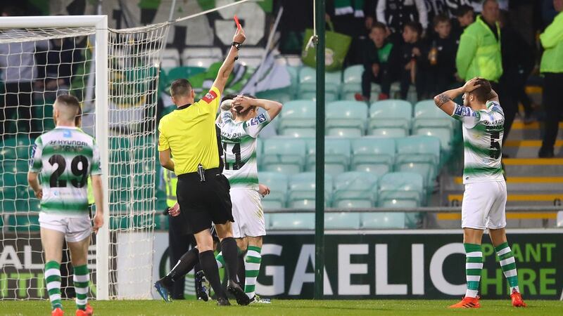 Referee Paul McLaughlin sends off Lee Grace during Shamrock Rovers’ defeat to Bohemians. Photograph: James Crombie/Inpho