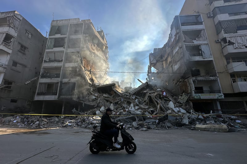 A scooter drivers past the damage left by Israeli air strikes in the Al-Chiyah area of southern Beirut on Thursday. Photograph: Wael Hamzeh/EPA