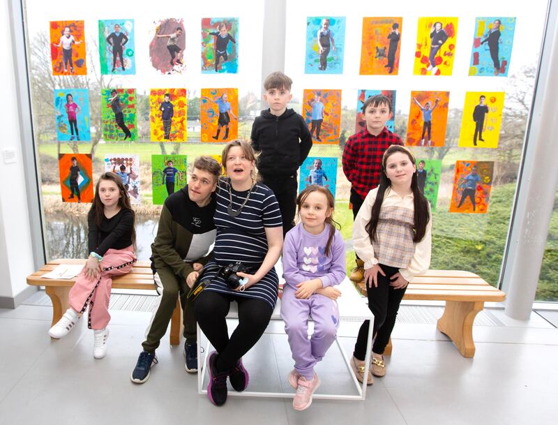 Artist Kate Murtagh Sheridan with some of the children at the exhibition. Photograph: Brian Farrell