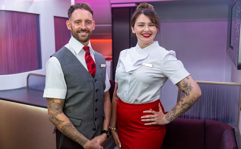 Virgin Atlantic cabin crew. The company's new policy allows crew to have tattoos. Photograph: Virgin Atlantic