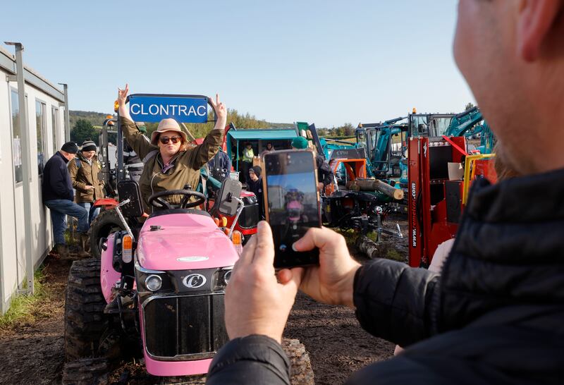 Angi McNulty goes pink for the Mater Foundation, posing on a pink tractor for brother Malachy. Photograph: Alan Betson/The Irish Times