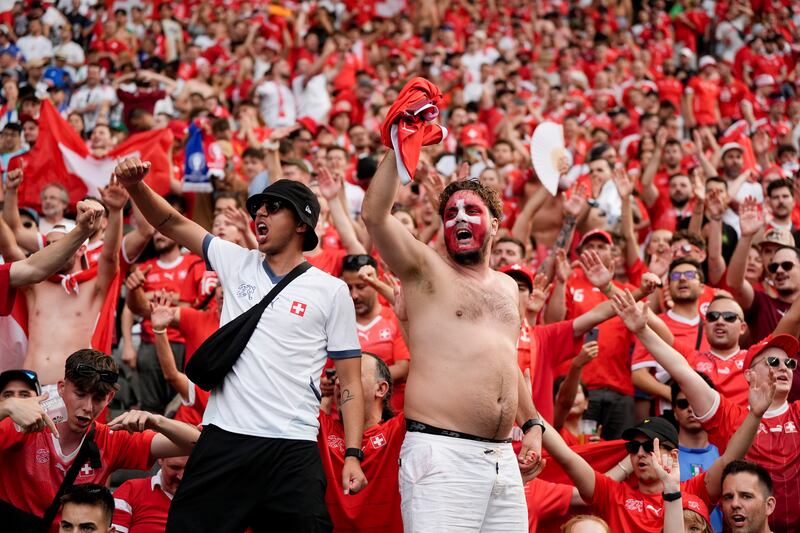 Switzerland fans show their support in the stands in Berlin. Photograph: Nick Potts/PA Wire